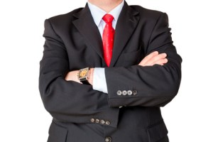 Geschftsmann mit verschrnkten Armen